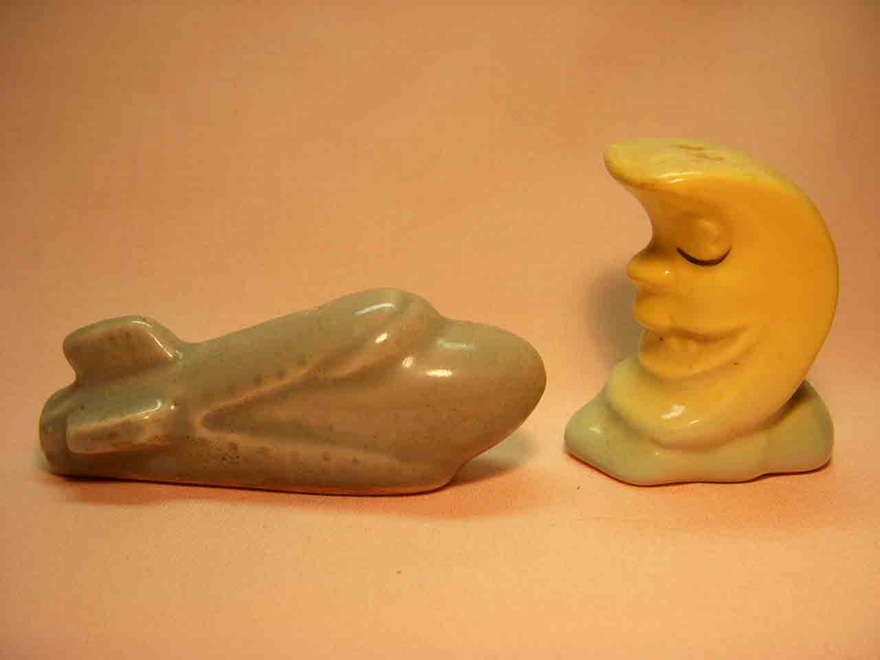 Go with rocket ship with anthropomorphic moon salt and pepper shaker