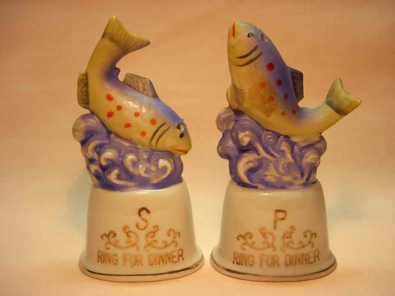 Fish on top of dinner bells salt and pepper shaker