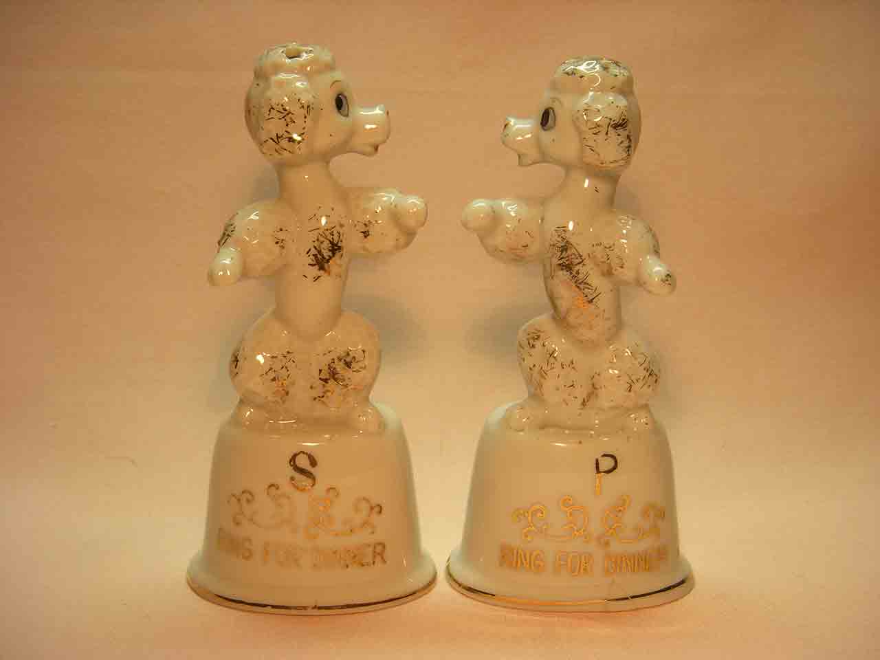 Vintage poodle dogs on dinner bells salt and pepper shakers